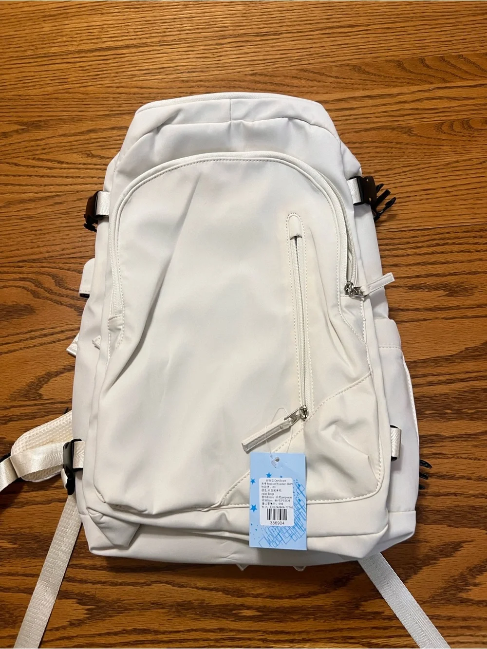 Off White Everyday Backpack with Front Zip Pocket!  Lots of pockets!